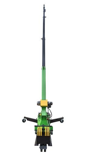 Green-and-black toy tractor with a tall antenna on a white background
