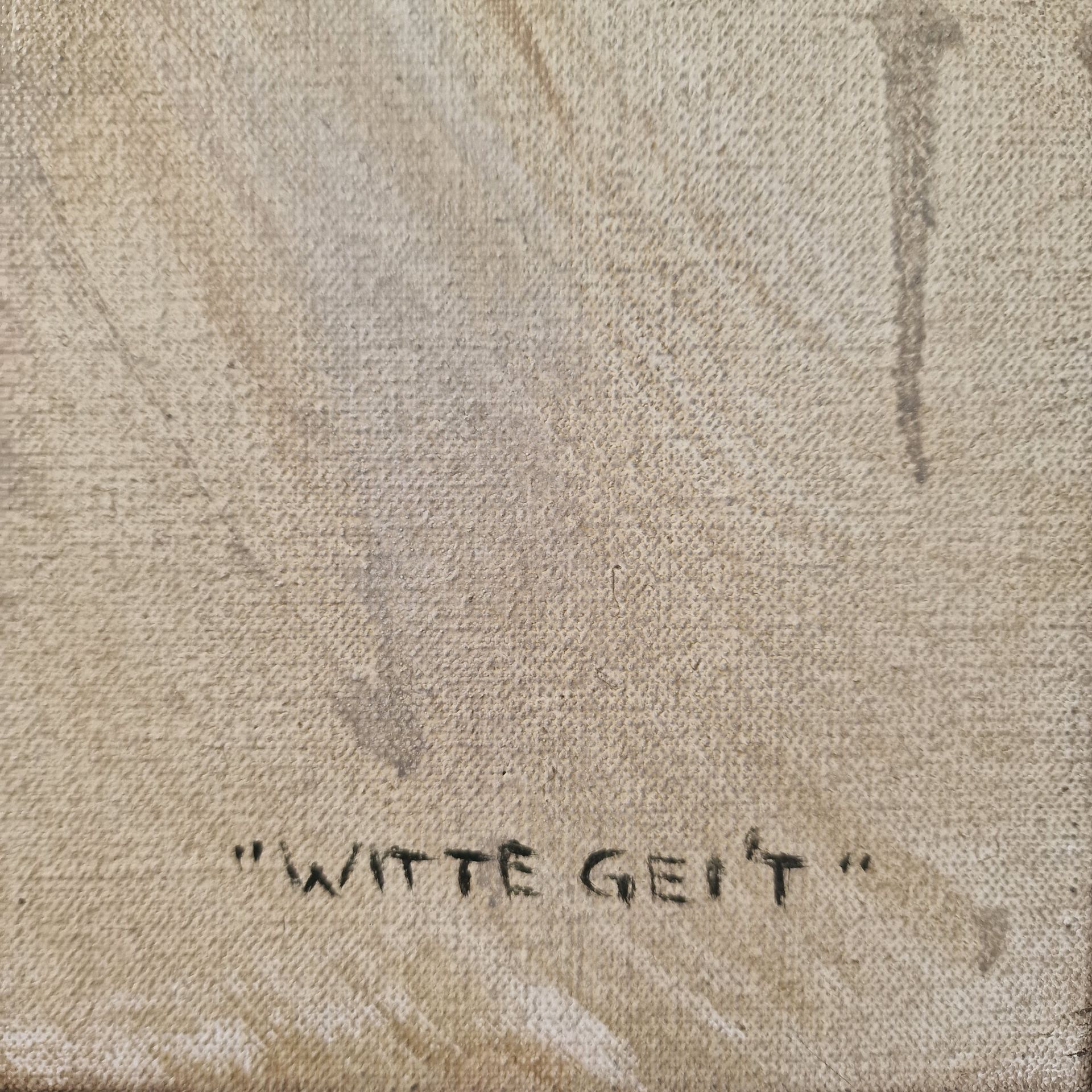 Een close-up van een schilderij met de tekst ``witte geit'' erop geschreven.