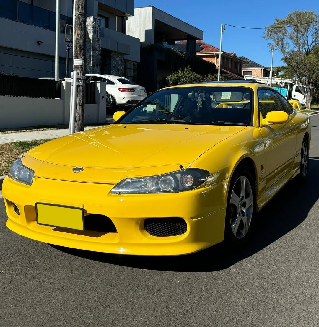 Yellow Nissan Silvia parked on a residential street — Amrix Automotive In Sefton, NSW