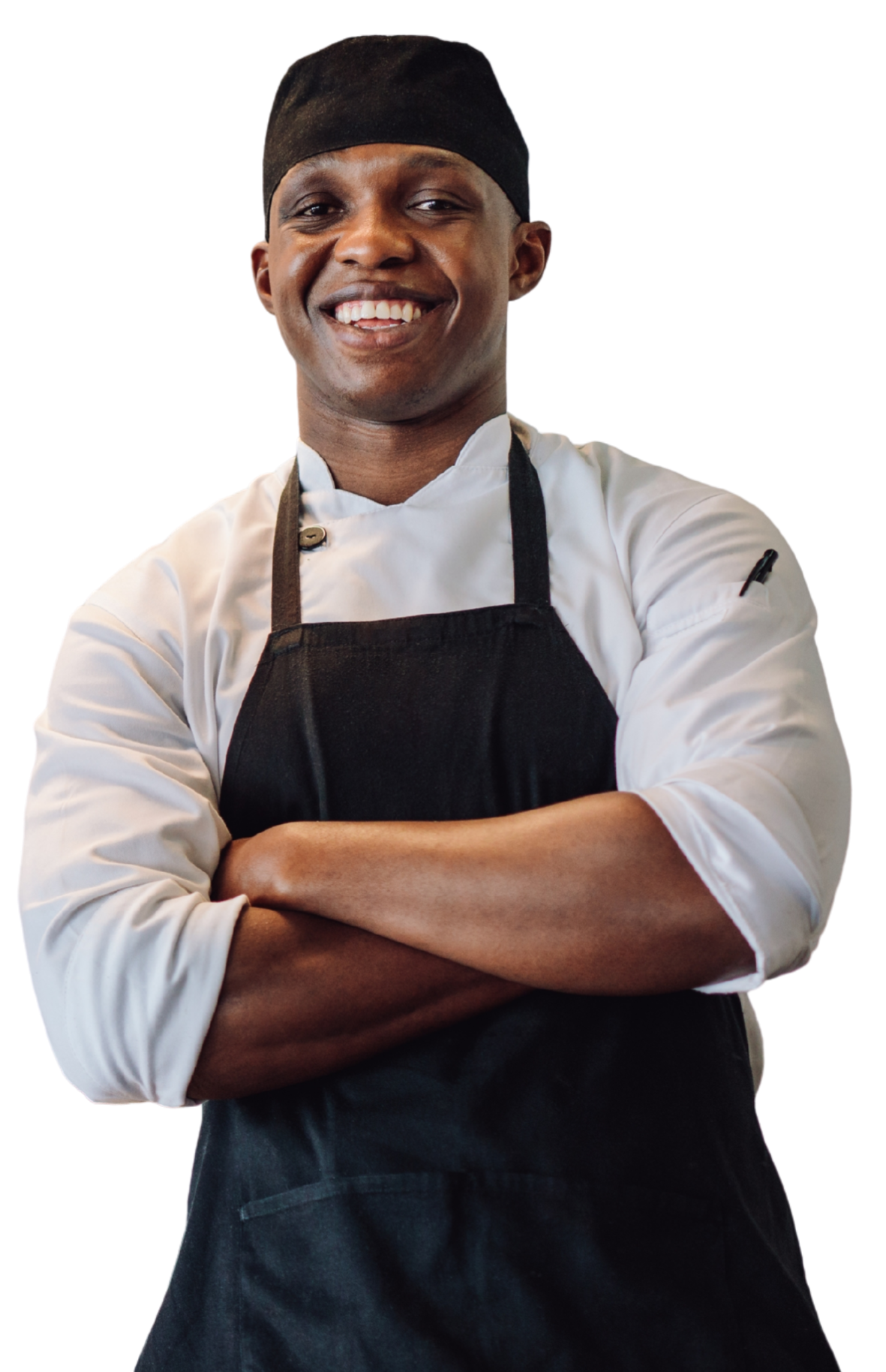 Chef with black apron and hat, arms crossed, smiling.