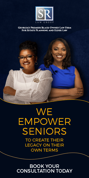 Two women are standing next to each other with their arms crossed.