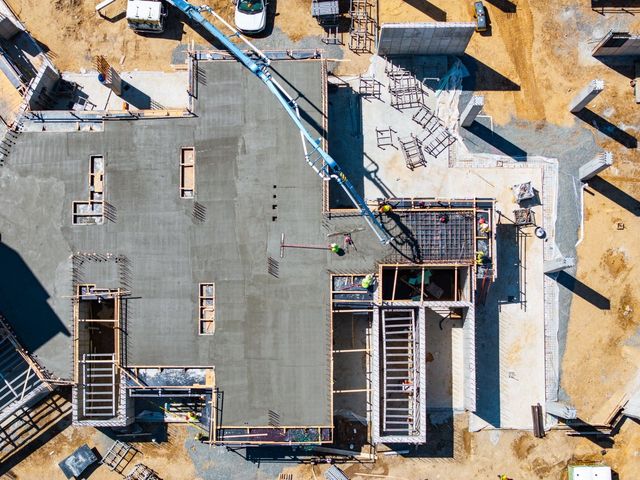 An aerial view of a building under construction.