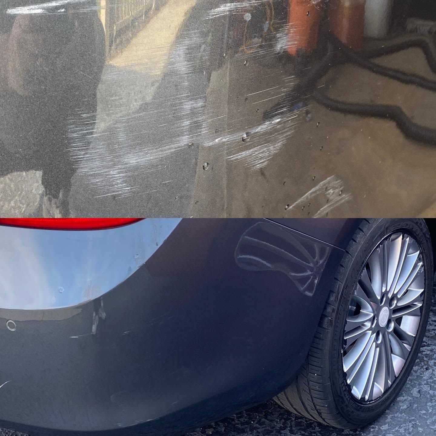Close-up of a dark blue car’s rear quarter panel and wheel with a red taillight.
