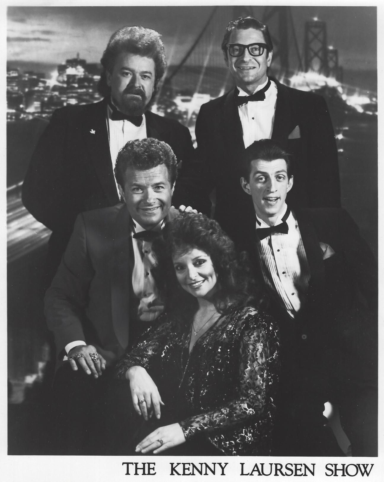 Black-and-white group portrait of five performers with “The Kenny Laursen Show” caption below