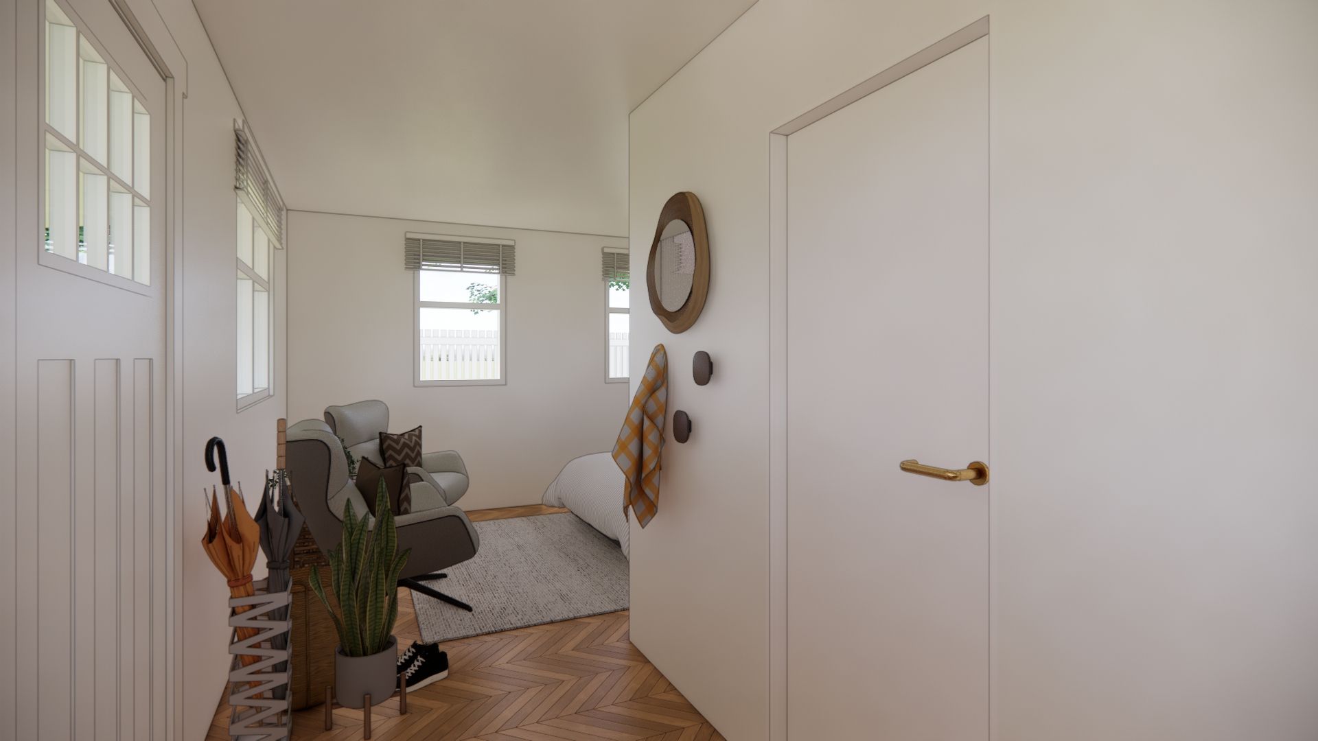 A hallway with a couch , umbrella holder , and mirrors.