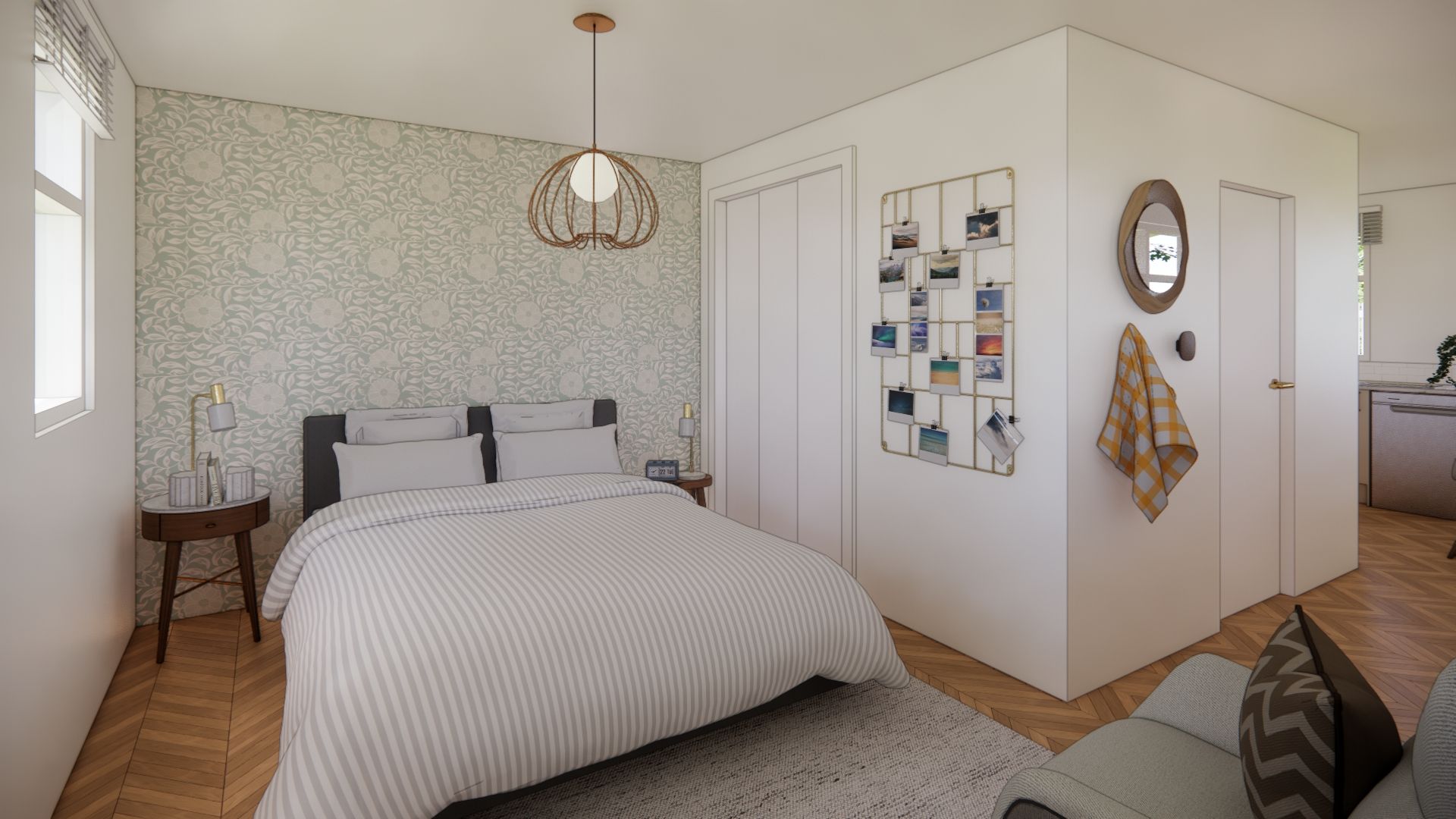 A bedroom with a bed , couch , nightstand and mirror.