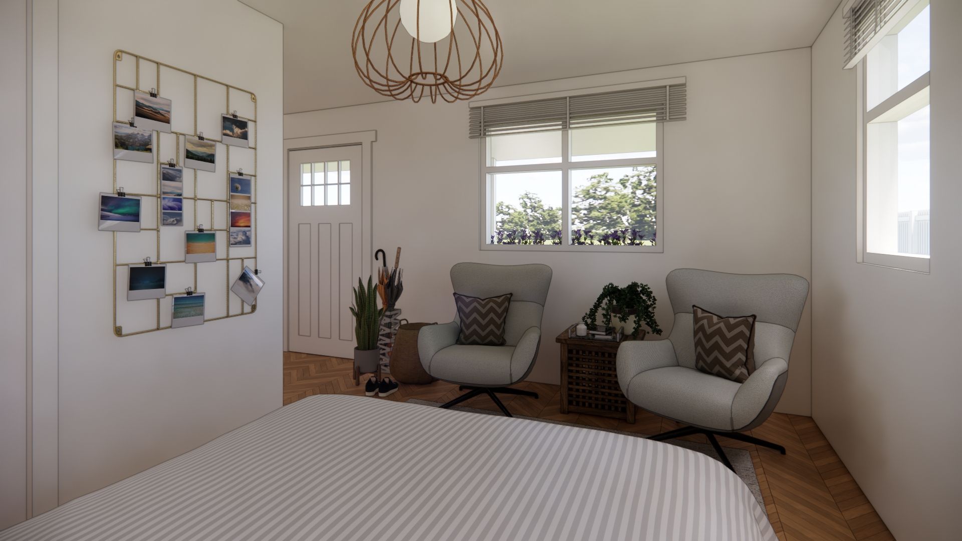 A bedroom with a bed , two chairs and a window.