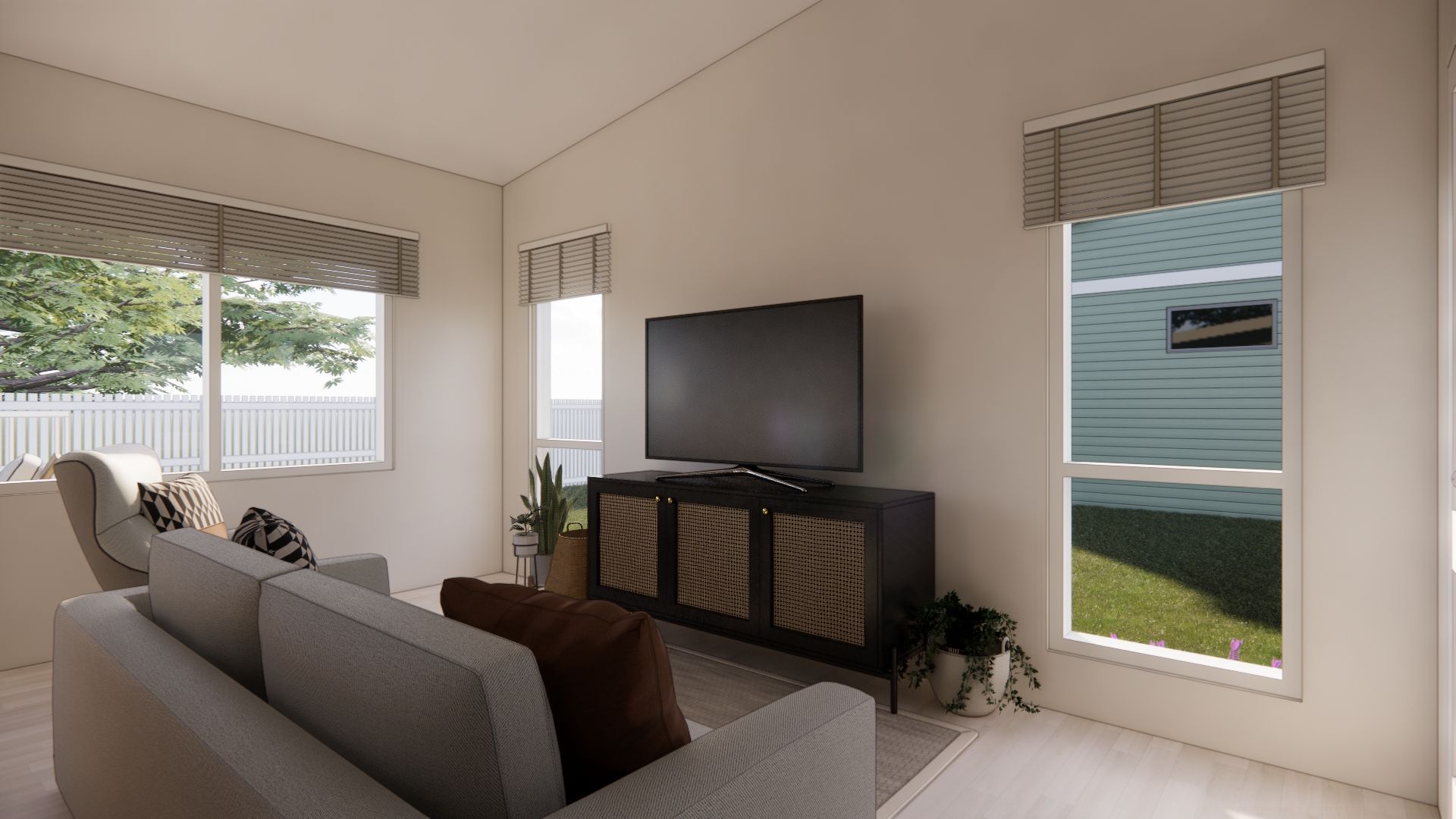 A living room with a couch , television , and two windows.