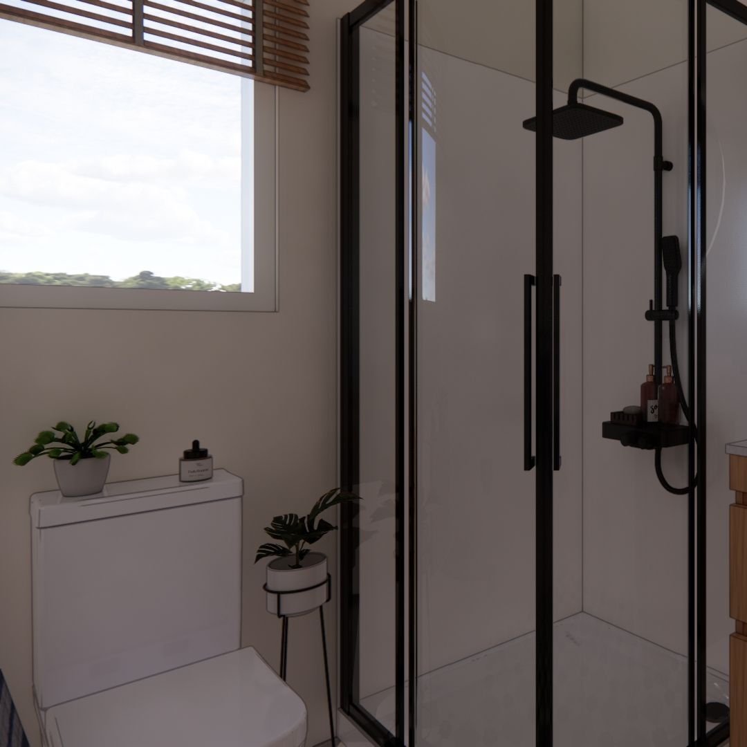 A bathroom with a toilet , shower and window