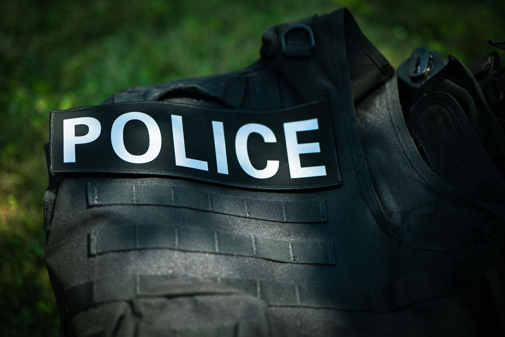 Black police tactical vest with a