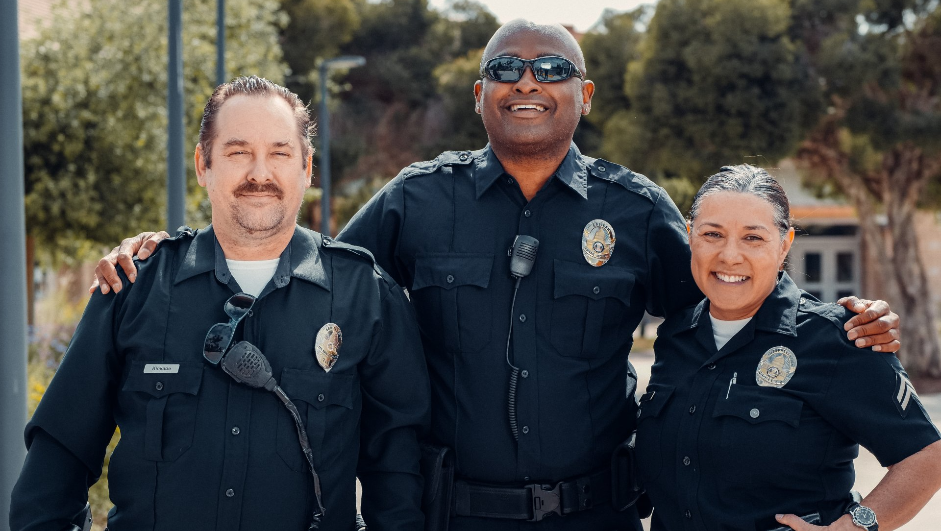 A group of police officers are posing for a picture together.