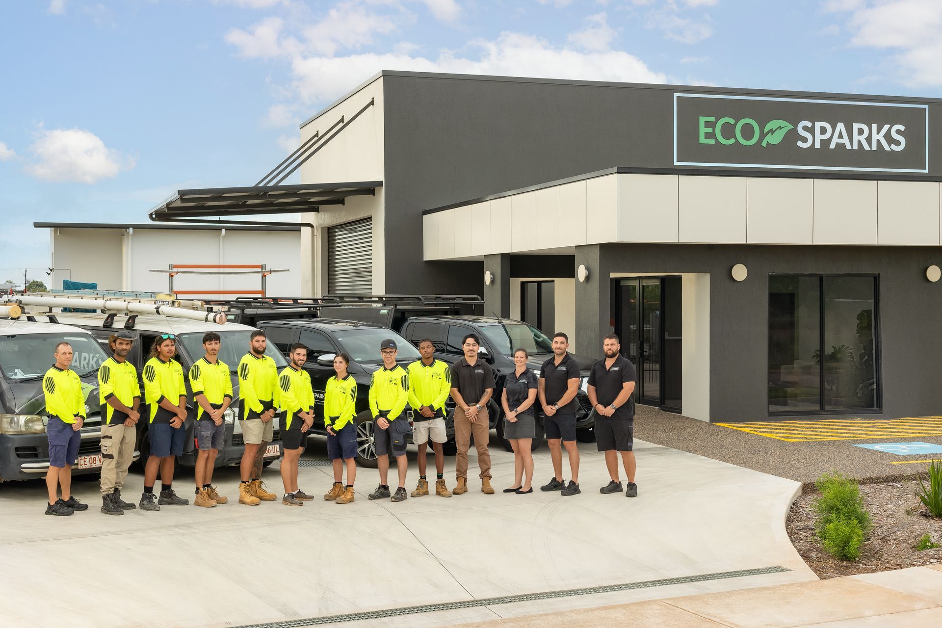 team photo infront of their van — Eco Sparks Solar & Electrical Contractors in Berrimah, NT