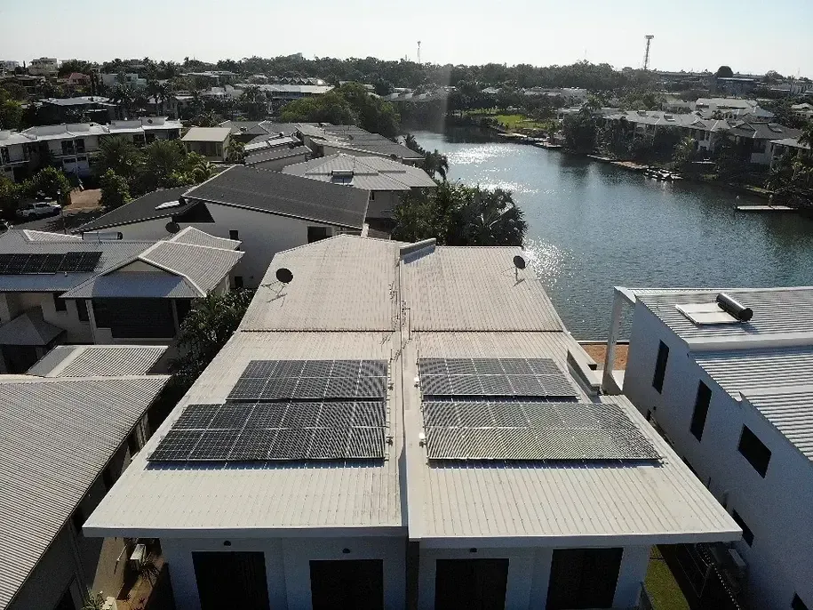 An Aerial View of A House with Solar Panels on The Roof — Eco Sparks Solar & Electrical Contractors in Berrimah, NT
