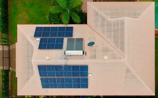 An Aerial View of A House with Solar Panels on The Roof — Eco Sparks Solar & Electrical Contractors in Berrimah, NT