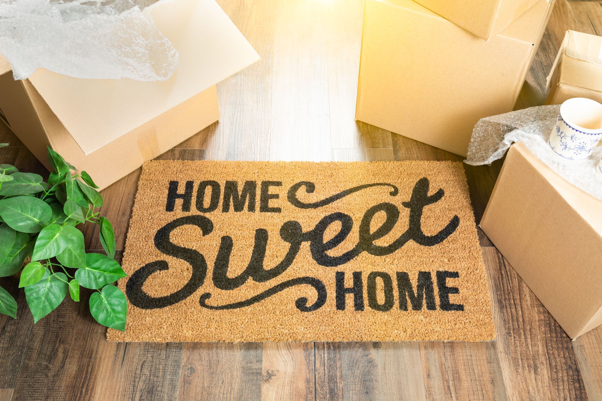 Stock photo of a welcome mat that says 