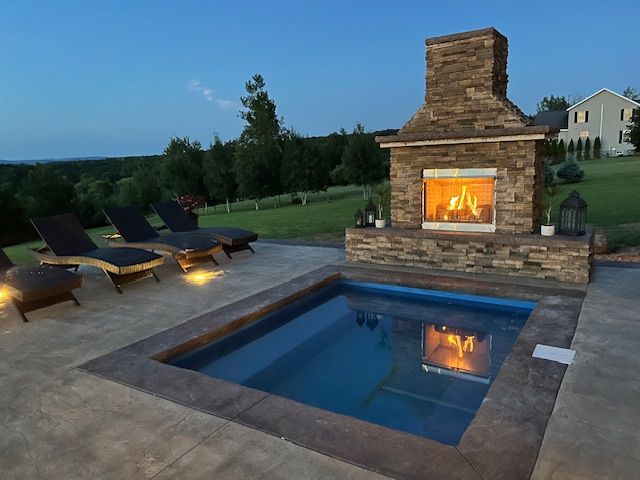 Pool in the Middle of Patio — Clinton, NY — CNY Custom Concrete & Masonry