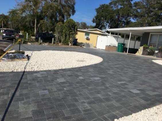 a driveway with a circle in the middle of it