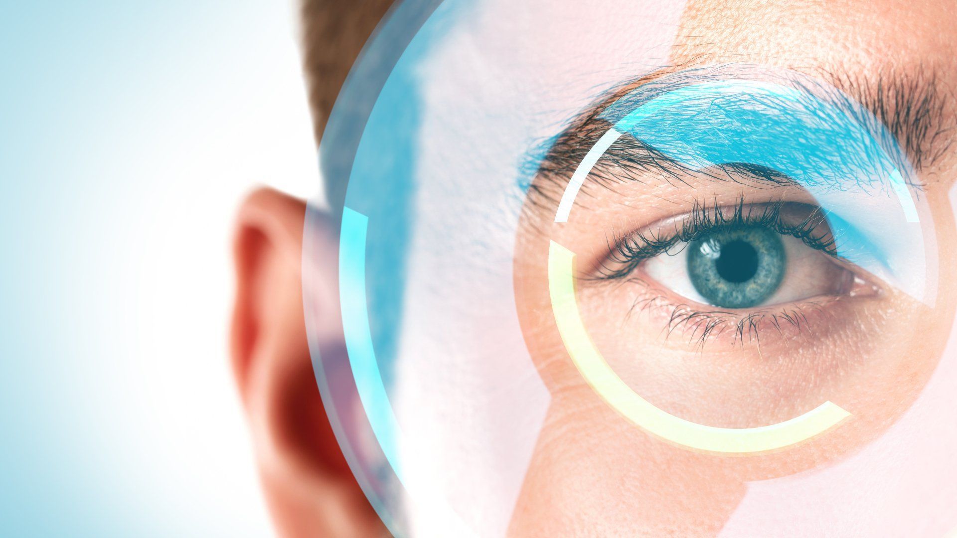 A close up of a woman 's eye with a magnifying glass on it.