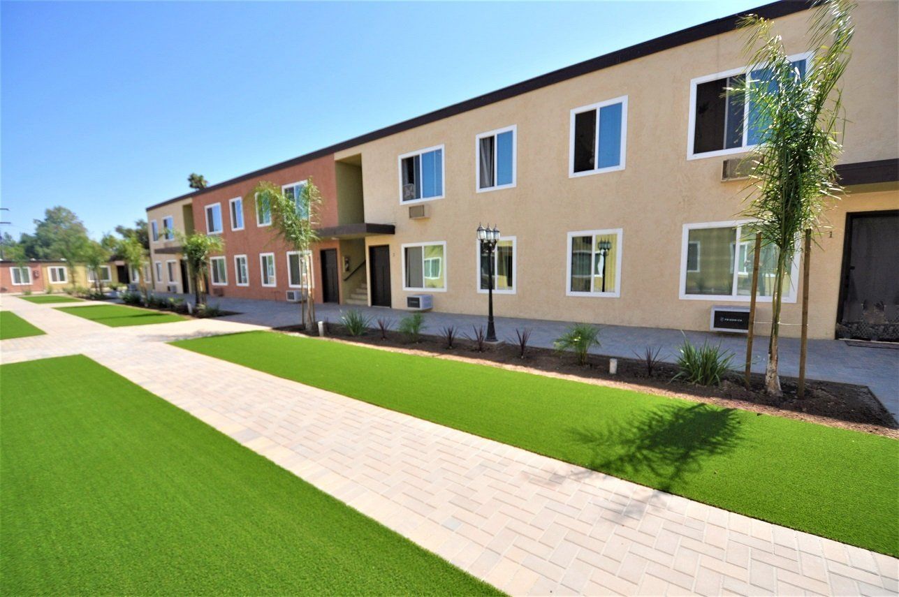 Village Green Apartments with grass 2