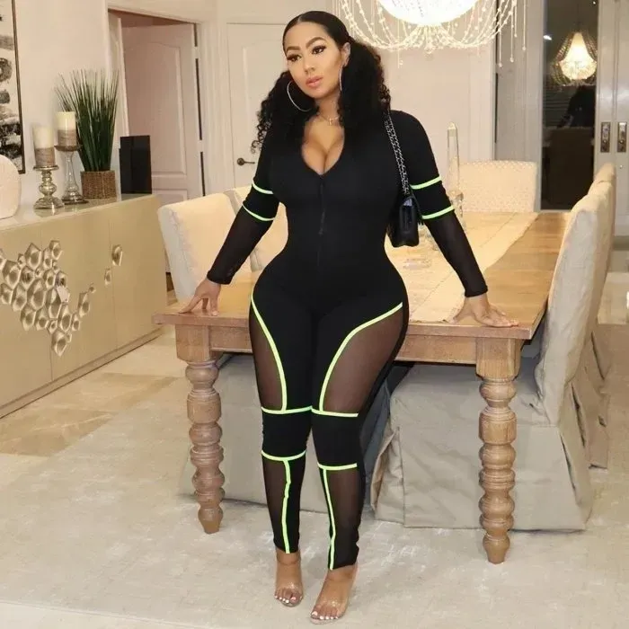 One piece body suit all black with neon green trimming