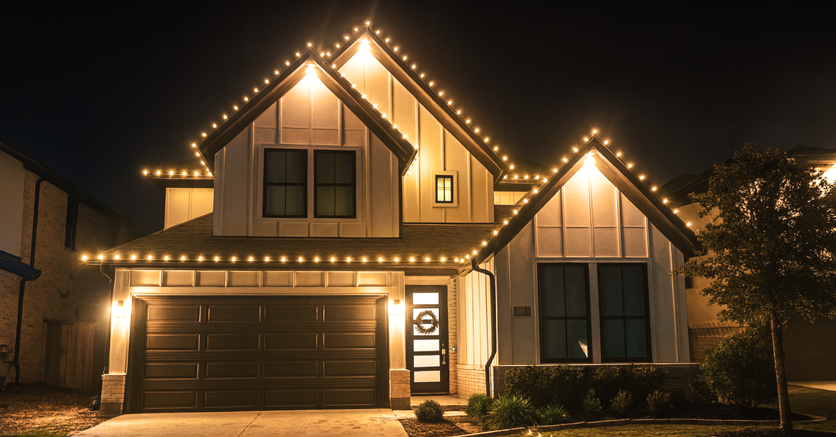 Christmas lights decorating roofline of home in Houston