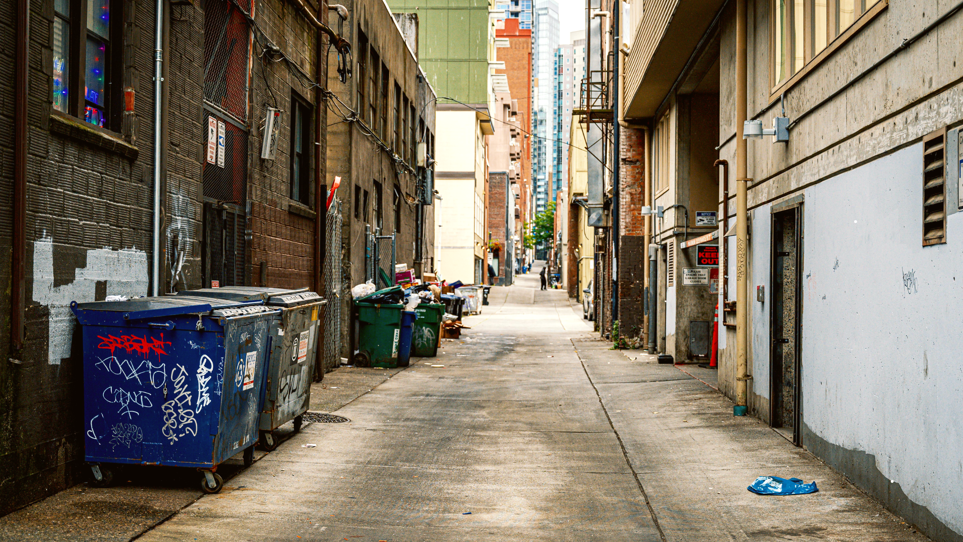 Houston dumpster pad walkway cleaned with commercial pressure washer