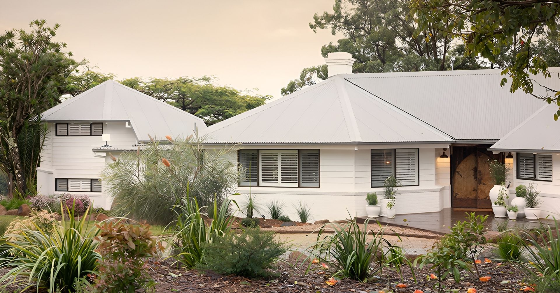 White House With Multiple Gabled Roofs — LeSands Screens & Blinds Moss Vale Pty Ltd in Moss Vale, NSW