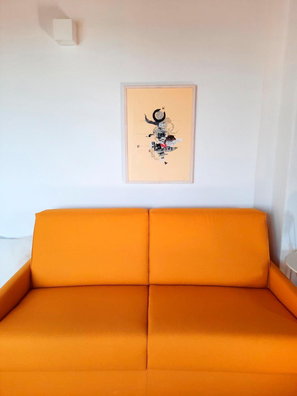 Camera con divano letto