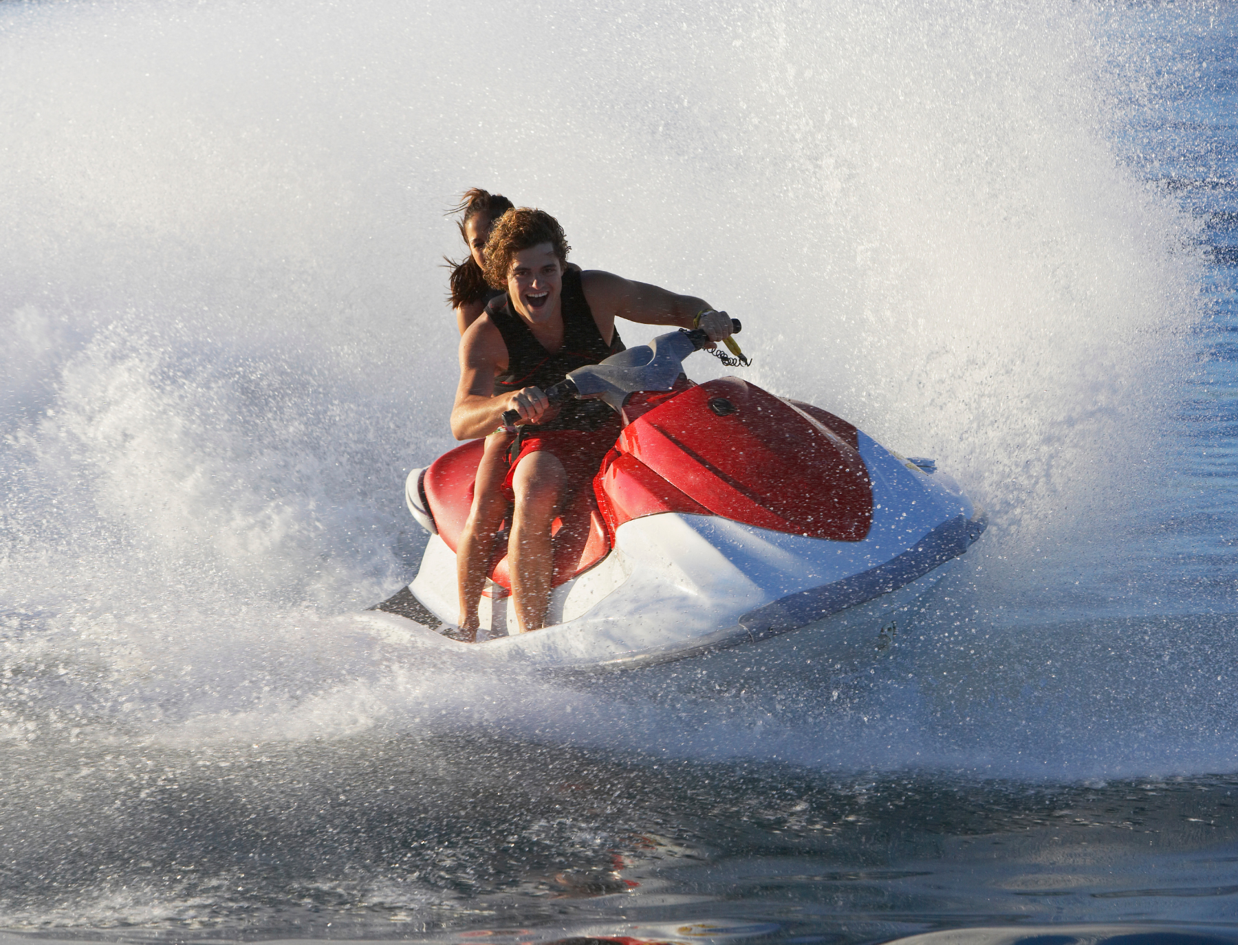 Two people on a jet ski