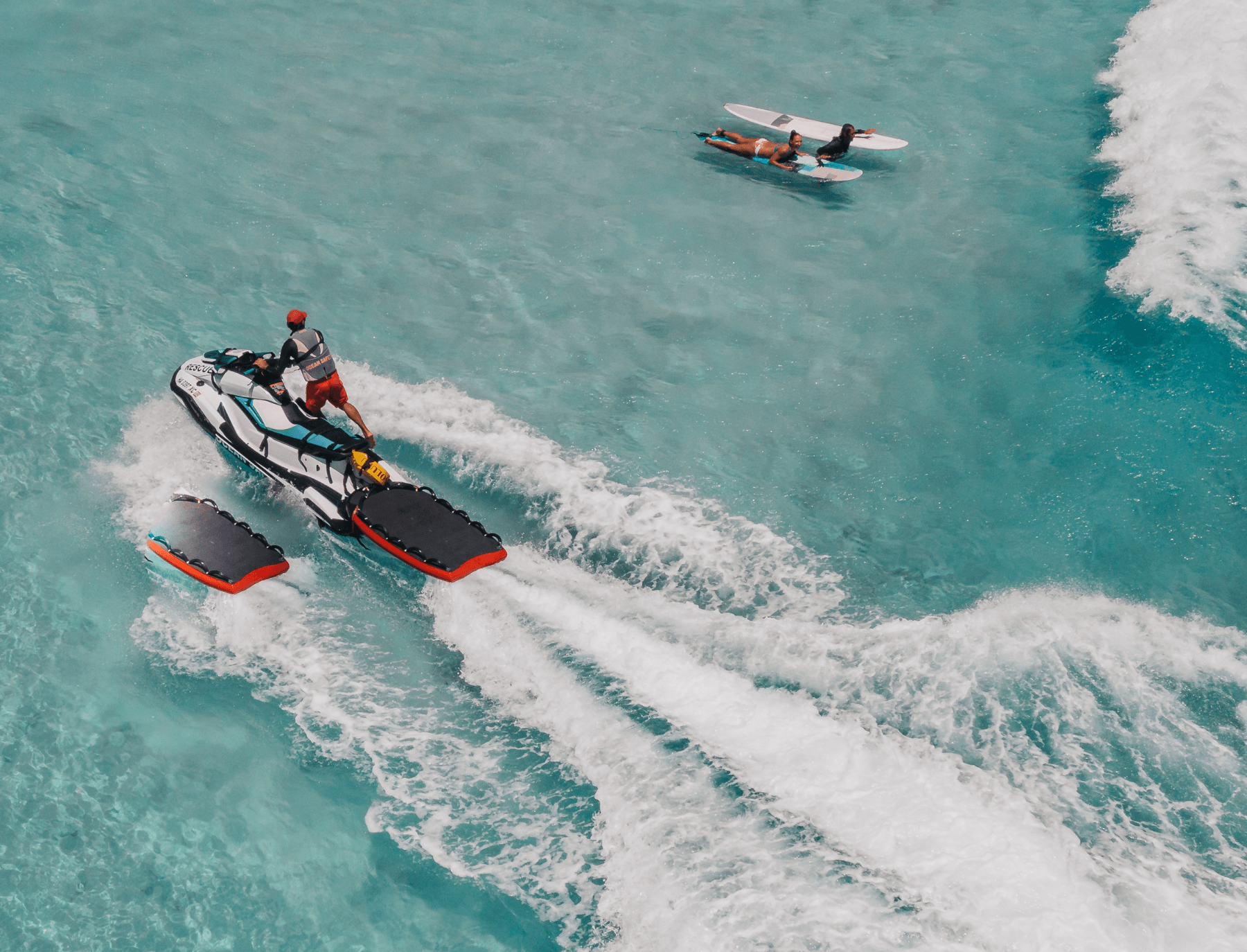 Top view of a guy riding jet ski