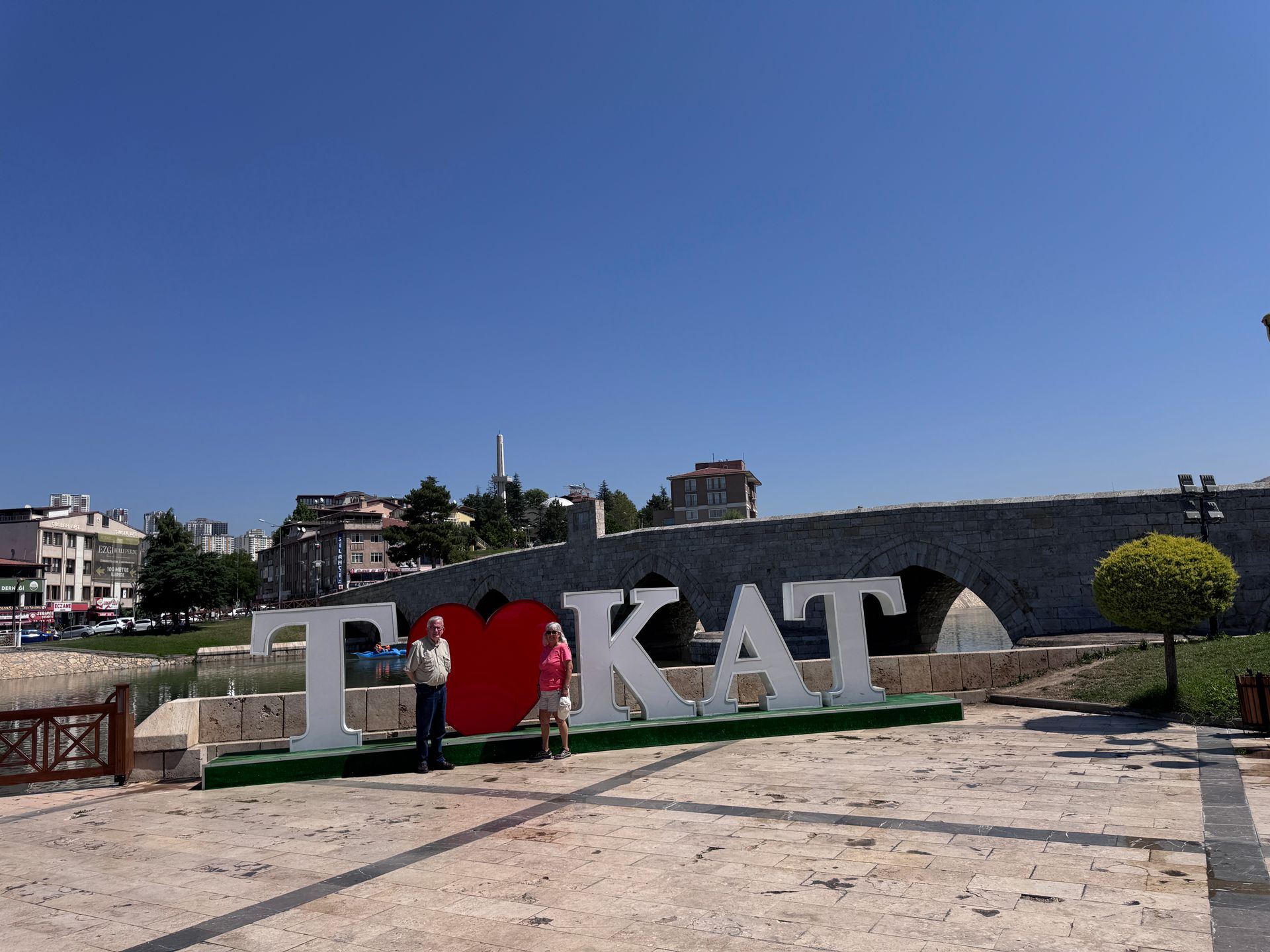 Photorealistic Tokat market with colorful Turkish spices, fresh produce, bread, and local shoppers