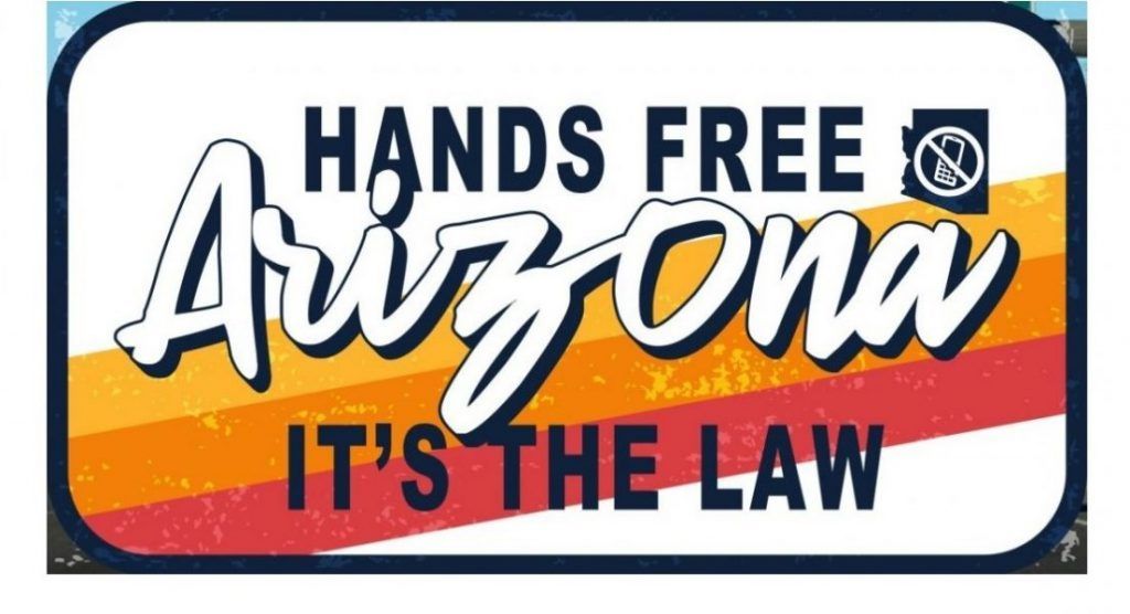 A sign that says hands free arizona it 's the law
