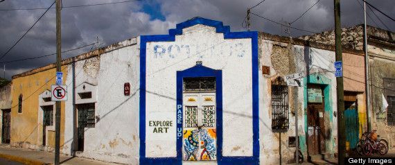 A blue and white building with the word art on it