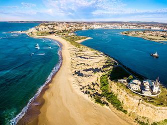 An Aerial View of A Beach and A Body of Water — DecoGlaze in Newcastle, NSW
