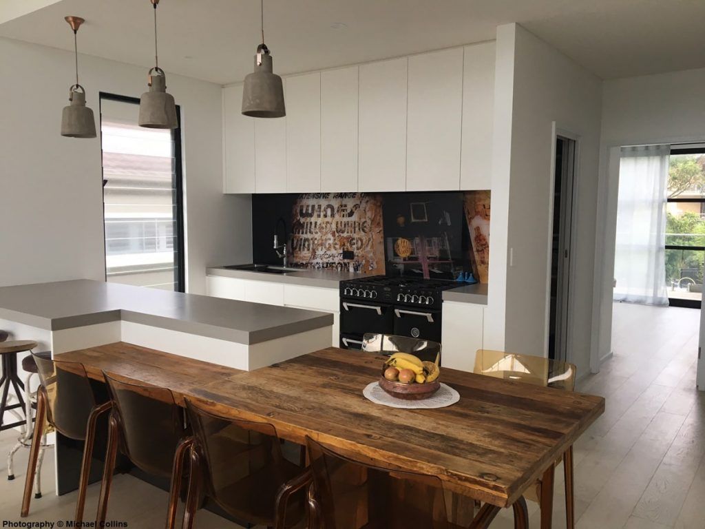 A Kitchen with A Wooden Table and Chairs and A Bowl of Bananas on It — DecoGlaze in Cessnock, NSW