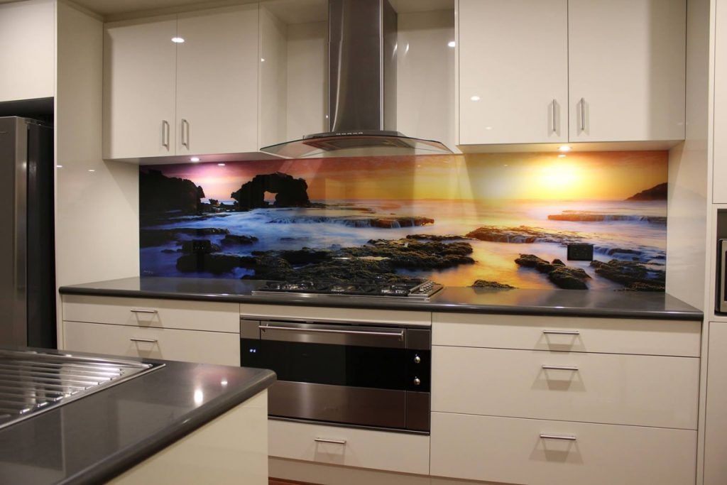A Kitchen with White Cabinets and Stainless Steel Appliances — DecoGlaze in Maitland, NSW