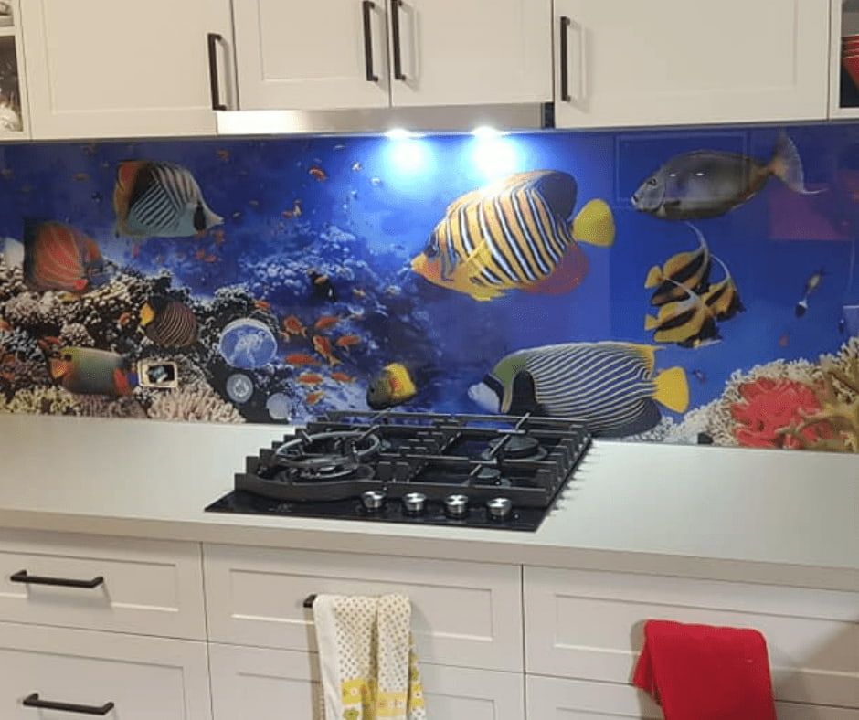 A Kitchen with A Stove Top Oven and A Picture of Fish on The Wall — DecoGlaze in Central Coast, NSW