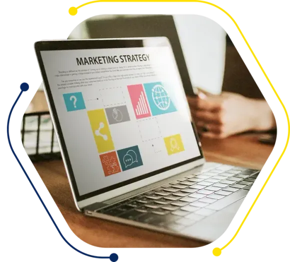 a laptop is open to a page that says marketing strategy