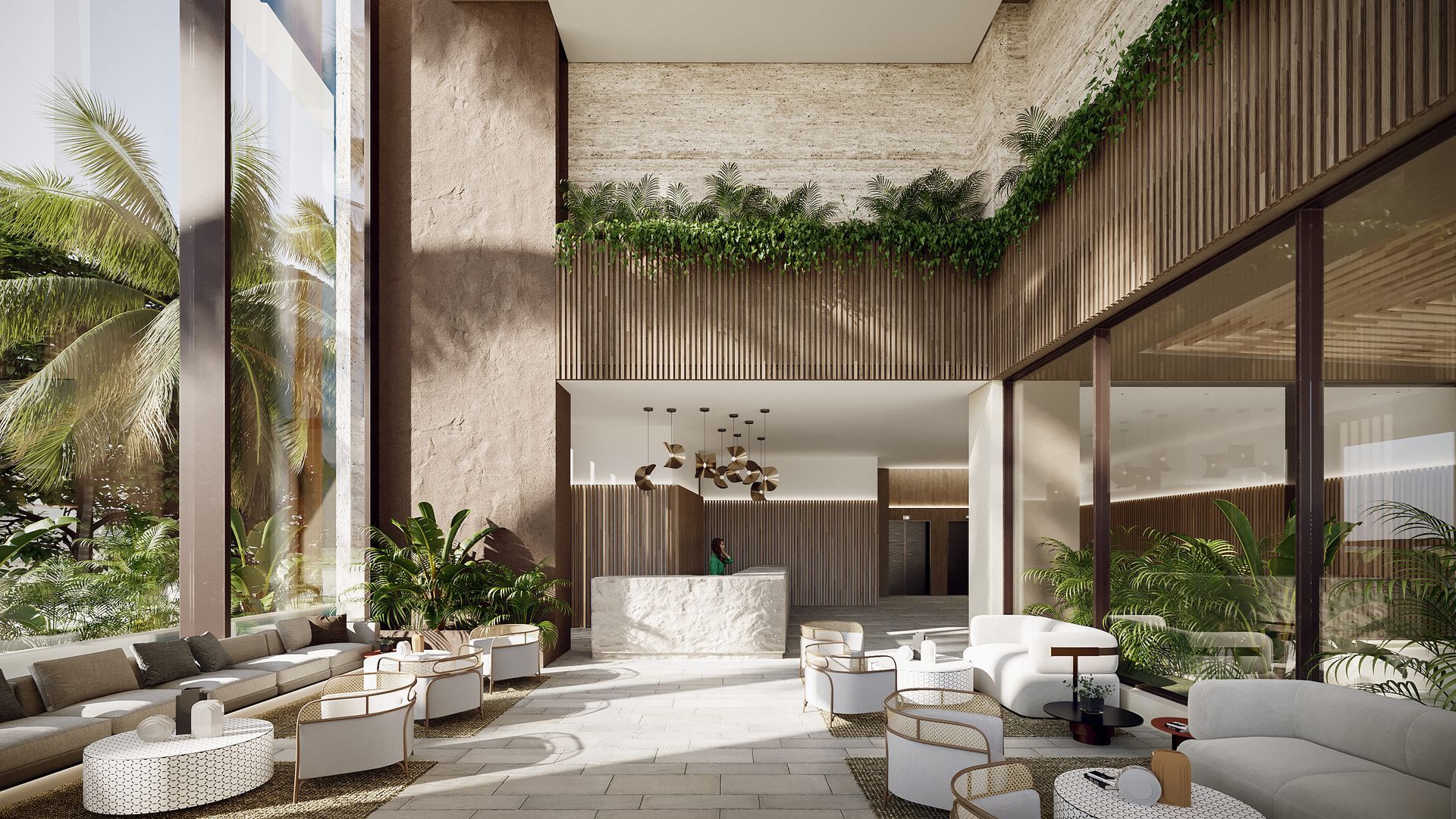 Lobby de Nuruma Suites by Emerawa, hotel Bello Horizonte Santa Marta con diseño moderno y vegetación natural.