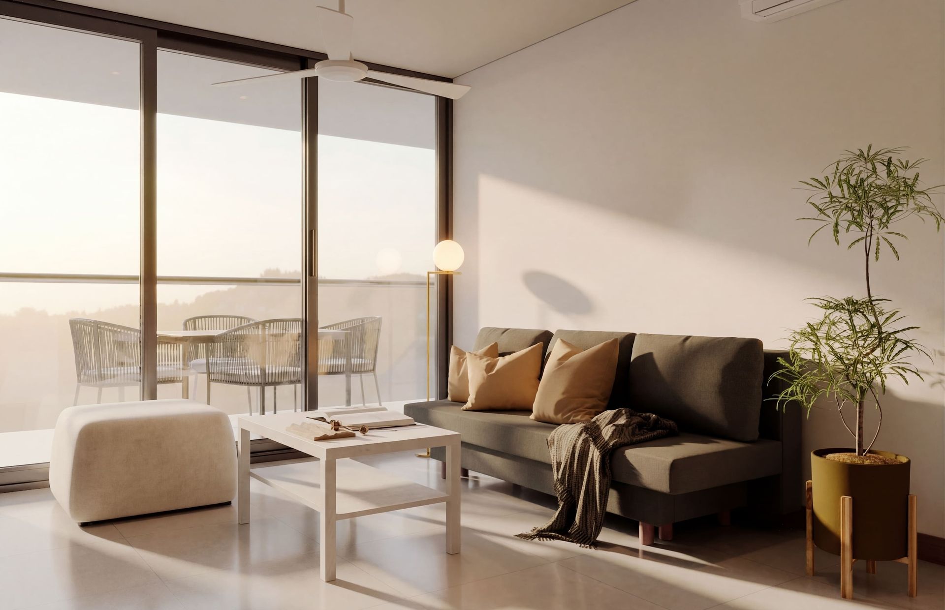 Accommodation in Bello Horizonte Santa Marta with sofa, table, plant, wide window and terrace at Nuruma Suites