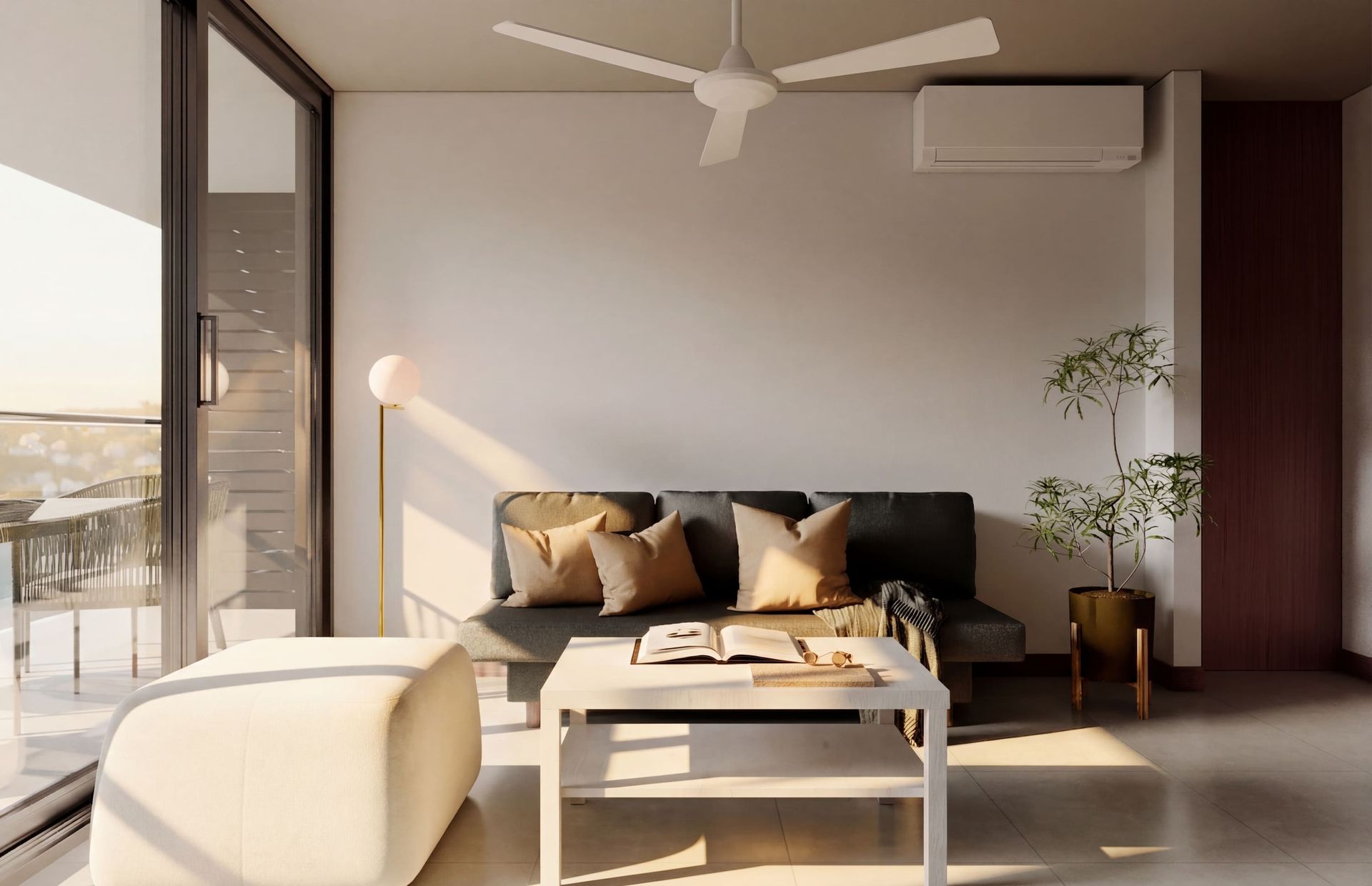 Hospedaje en Bello Horizonte Santa Marta con sala, sofá oscuro, mesa de centro, balcón y luz cálida en Nuruma Suites