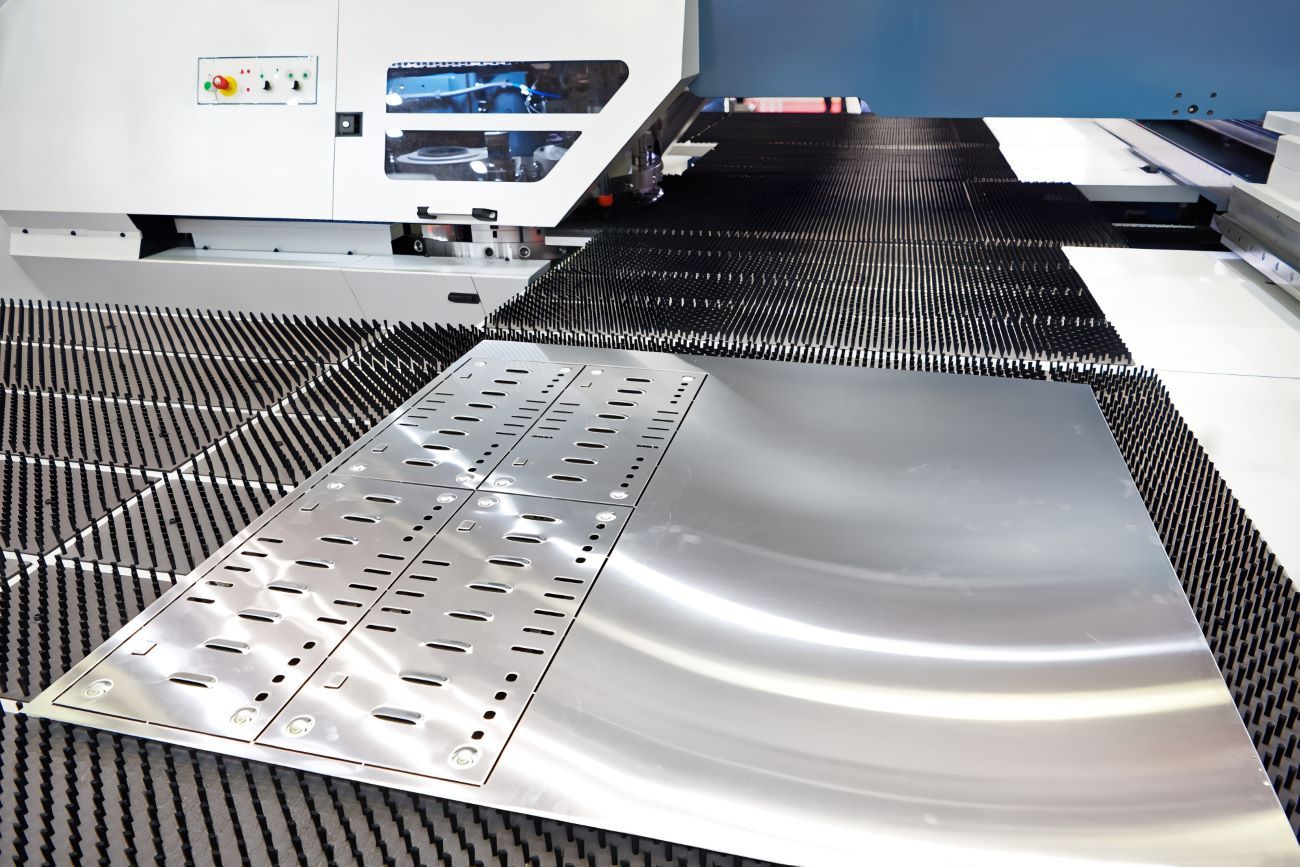 A Machine Is Cutting a Piece of Metal — Berkeley Vale Hydraulics in Fountaindale, NSW