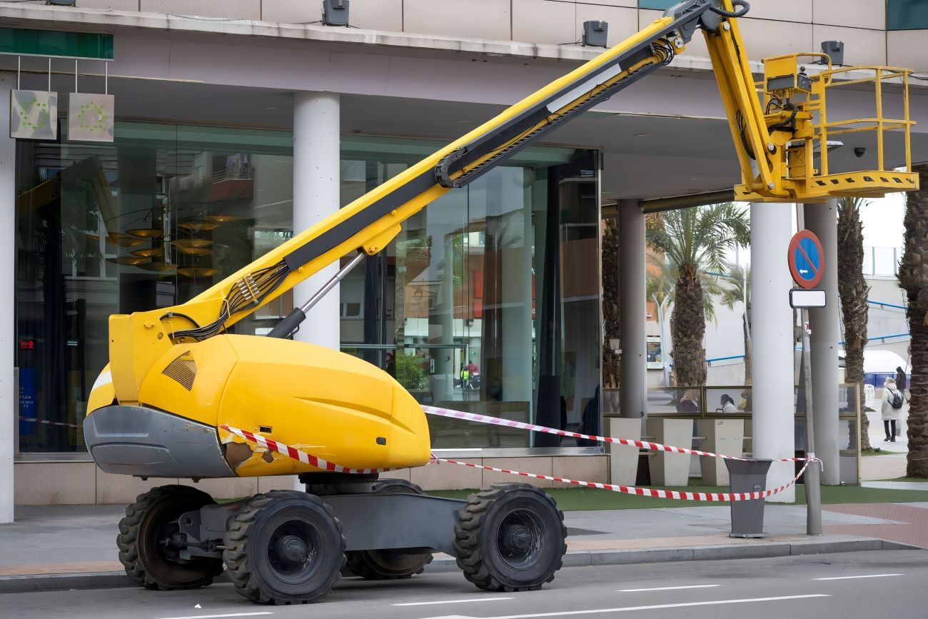 A Crane Is Parked on The Side of The Road — Berkeley Vale Hydraulics in Fountaindale, NSW
