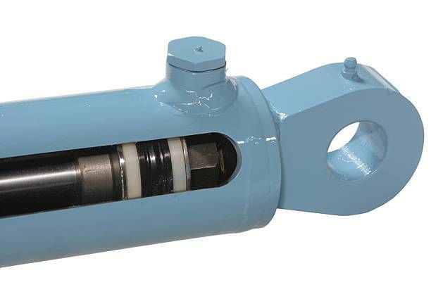 A Close up Of a Yellow Hydraulic Cylinder — Berkeley Vale Hydraulics in Fountaindale, NSW
