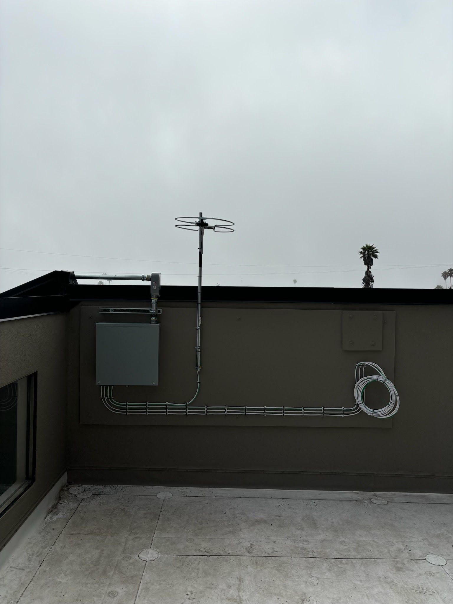 The roof of a building with a box on it