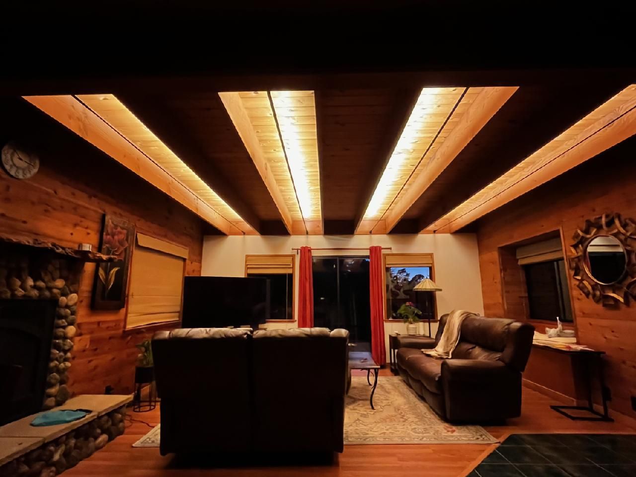 A living room with a fireplace and a couch