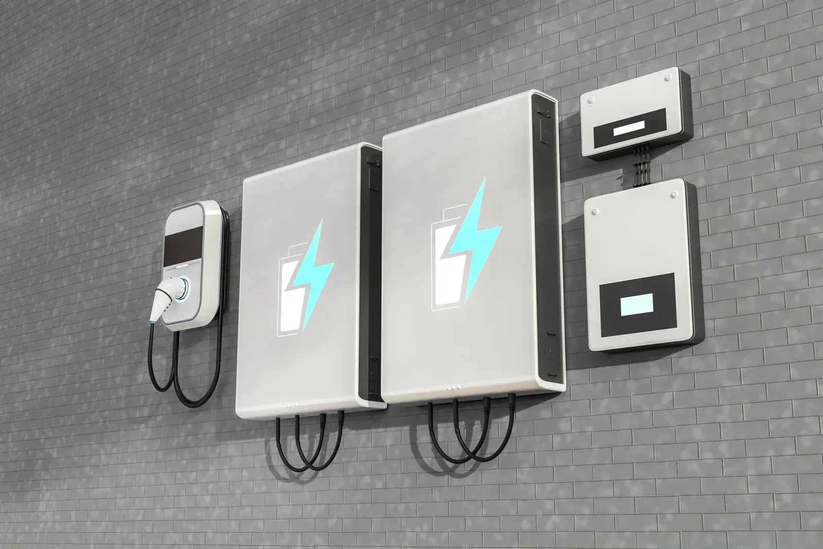 A row of electric vehicle charging stations on a brick wall.