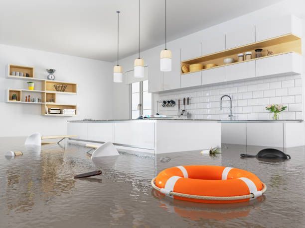 Flooded kitchen with water damage