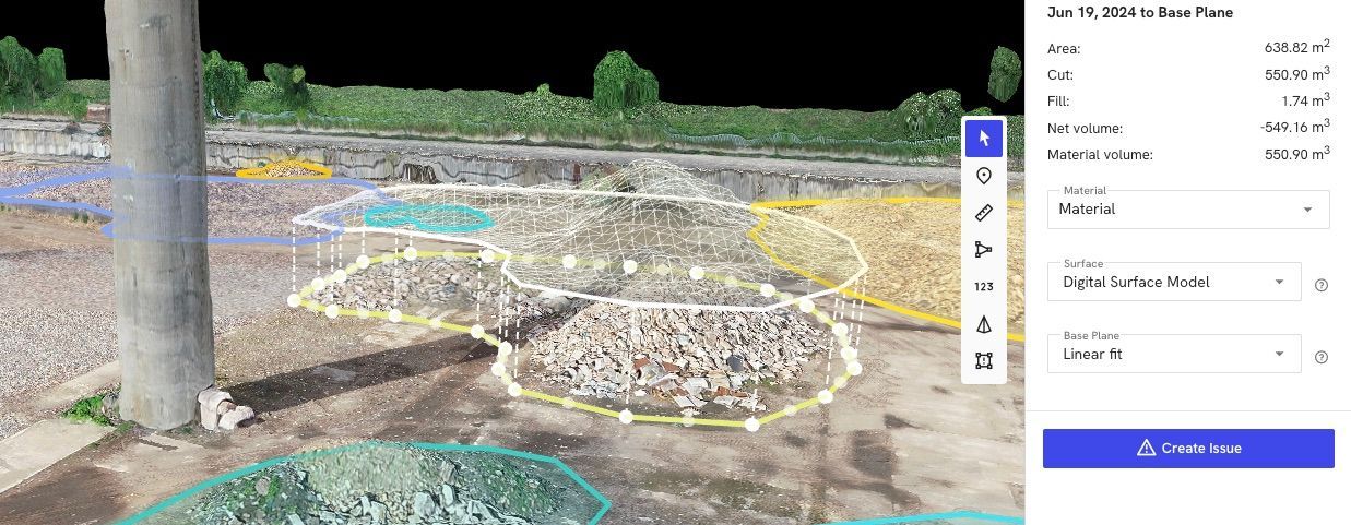 An aerial view of a construction site with segmented areas marked by colored outlines, data and options on the right.