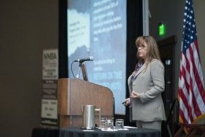Dr. Henderson speaking at NNBA Annual Conference